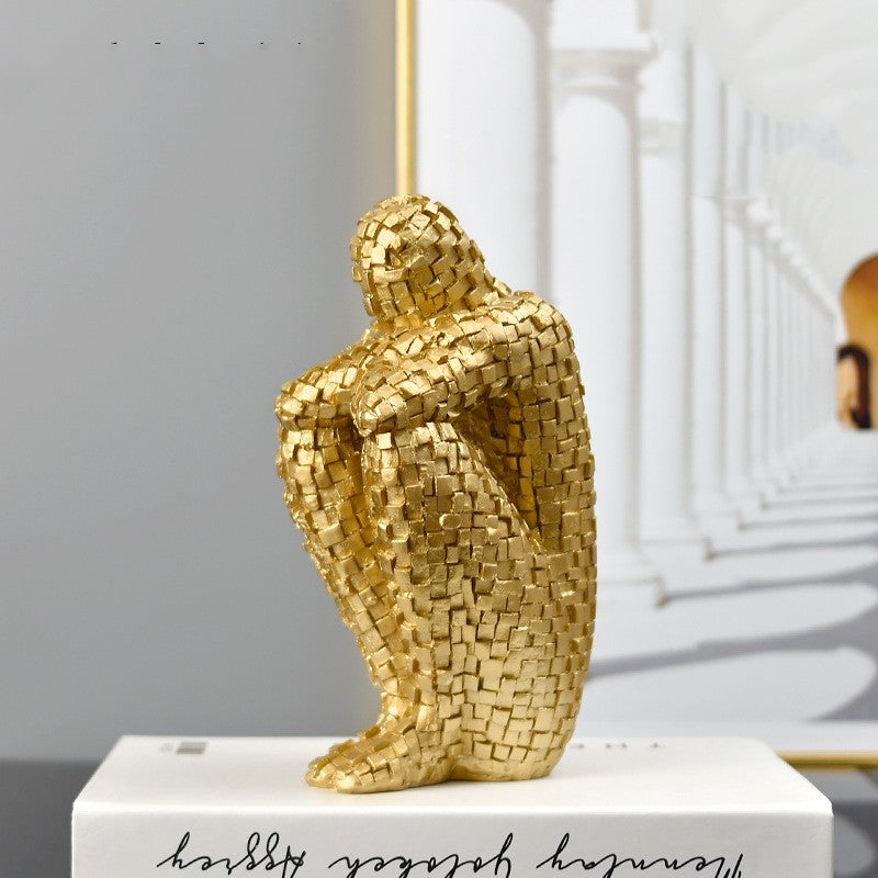 "The Puzzled" Sitting Statue