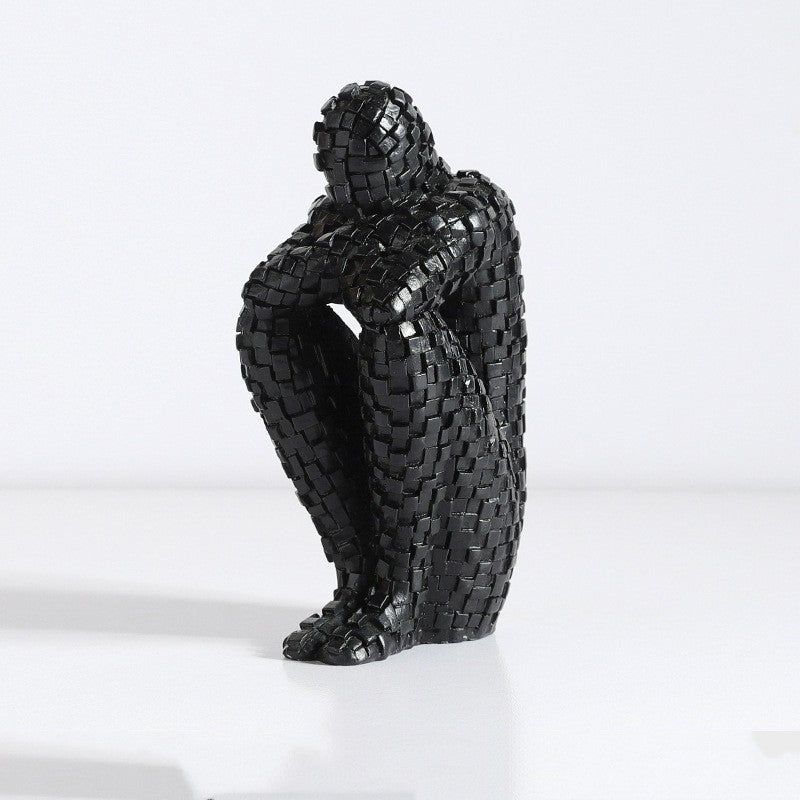 "The Puzzled" Sitting Statue