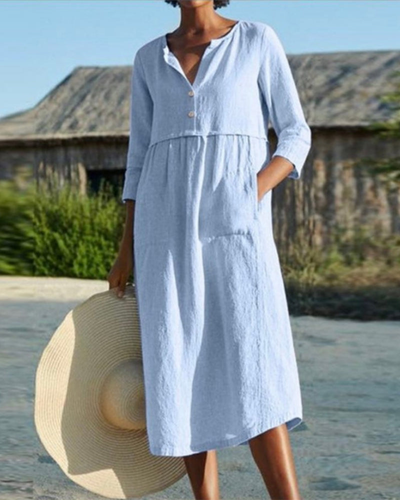 Sloane - Robe mi-longue élégante à manches mi-longues et design plissé