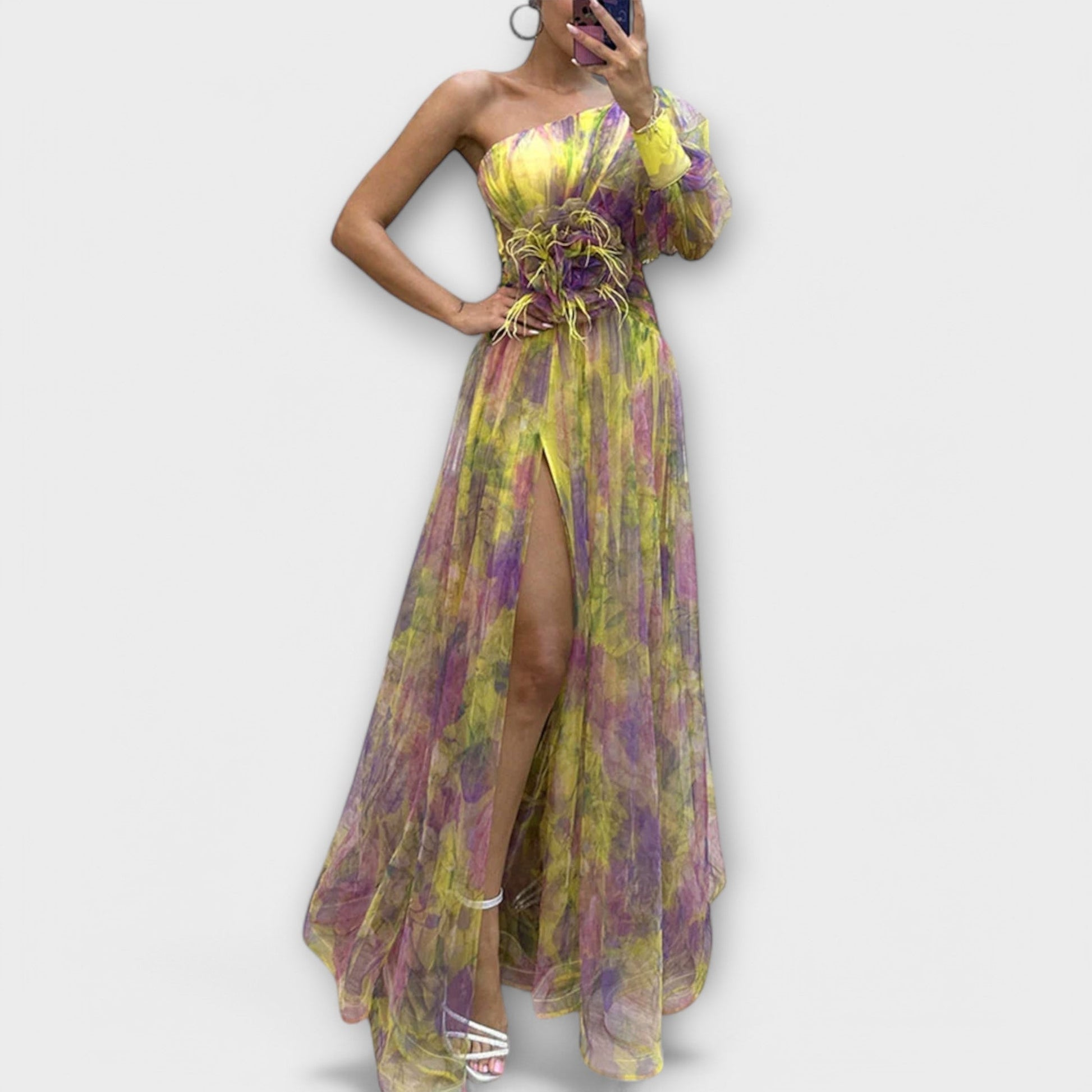 Elegant evening dress with one shoulder strap and tailored cut