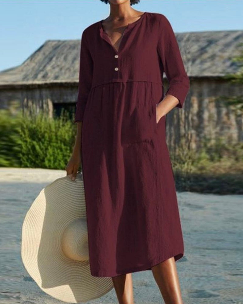 Sloane - Robe mi-longue élégante à manches mi-longues et design plissé