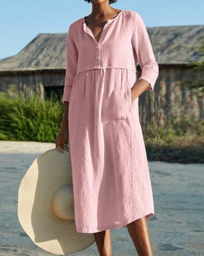 Sloane - Robe mi-longue élégante à manches mi-longues et design plissé
