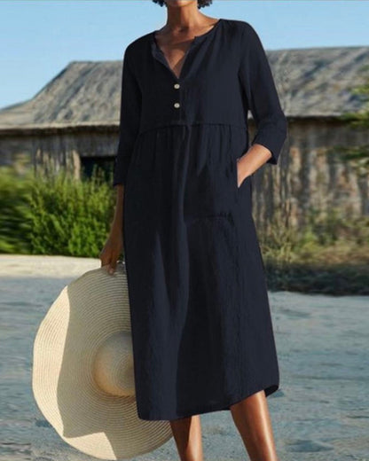 Sloane - Robe mi-longue élégante à manches mi-longues et design plissé
