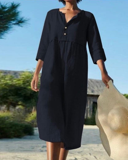 Sloane - Robe mi-longue élégante à manches mi-longues et design plissé