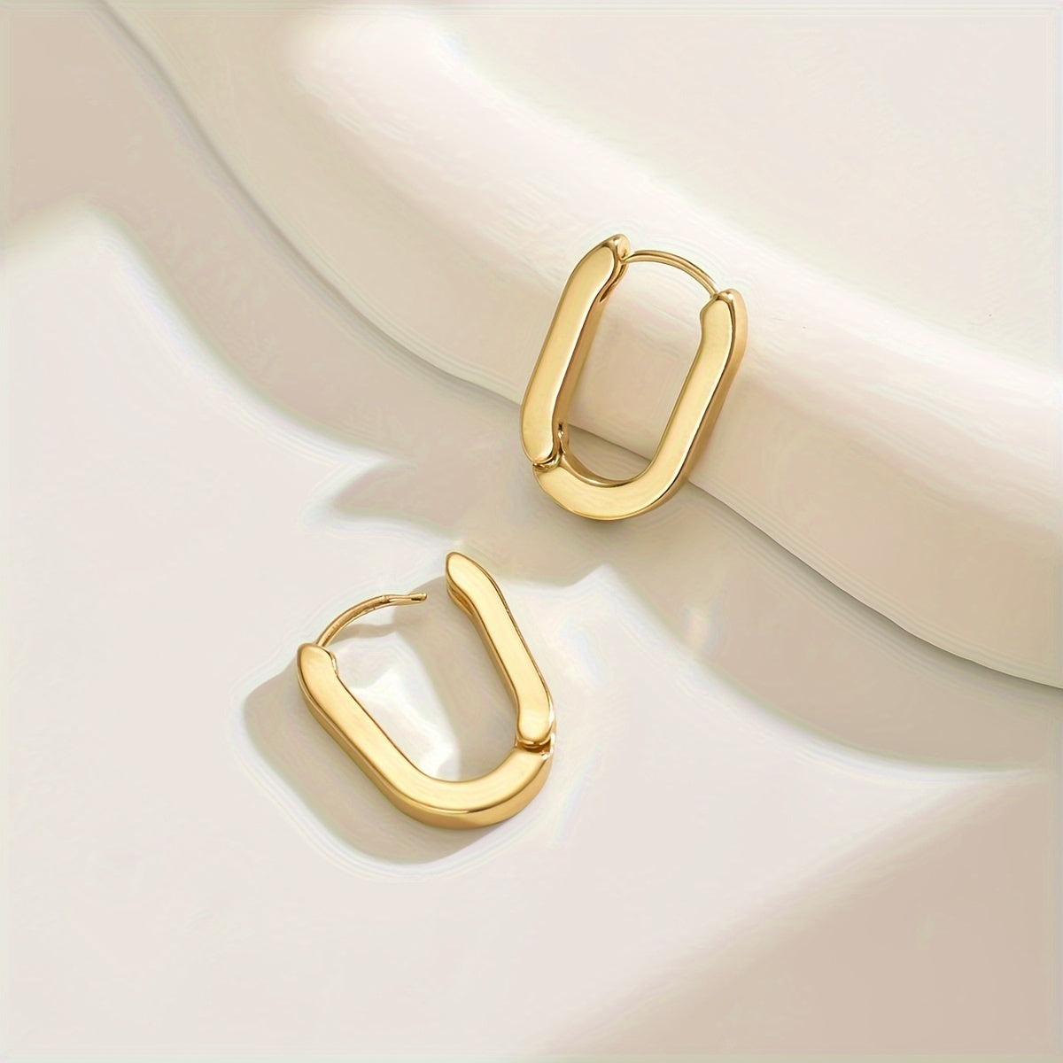 Elegante geometrische Creolen