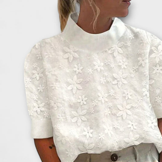 Marta | Blusa con cuello alto sencillo y bordado