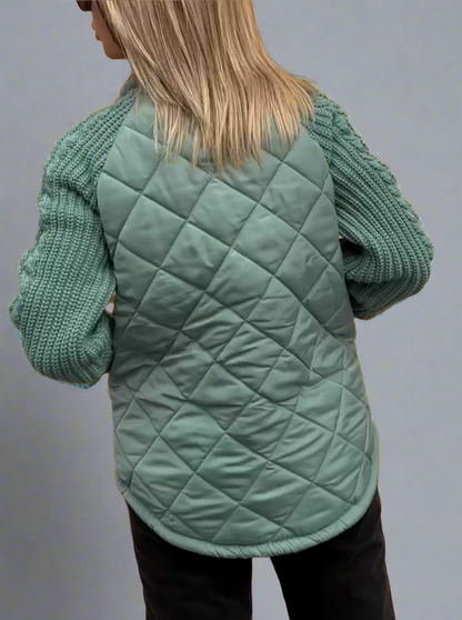 Padded jacket with knitted sleeves