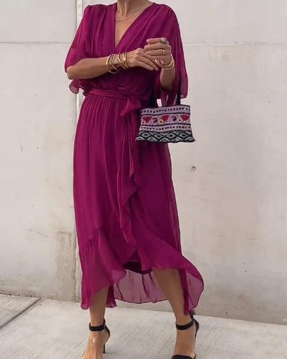 Robe Femme Cristi – Élégante Robe Portefeuille avec Manches Chauve-Souris & Ourlet Asymétrique