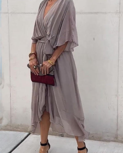 Robe Femme Cristi – Élégante Robe Portefeuille avec Manches Chauve-Souris & Ourlet Asymétrique