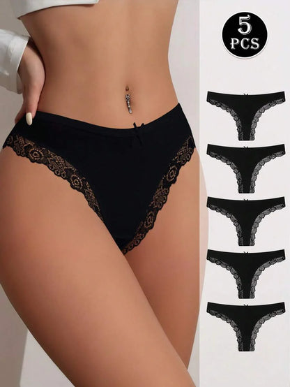 Conjunto de 5 calcinhas fio dental pretas de algodão com detalhes em renda e laço delicado. Modelo minimalista sem costura.