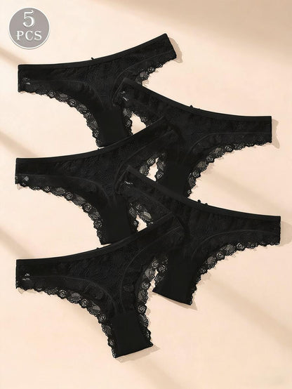 Conjunto de 5 calcinhas fio dental pretas de algodão com detalhes em renda e laço delicado. Modelo minimalista sem costura.