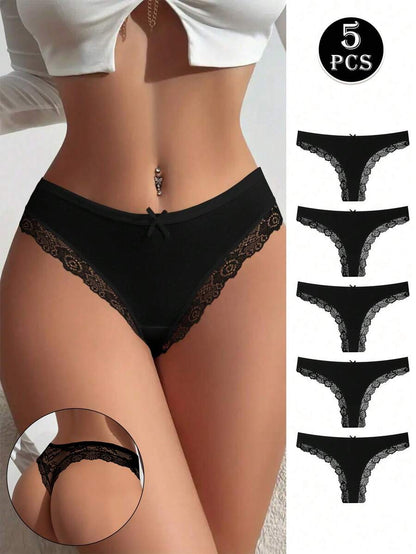 Conjunto de 5 calcinhas fio dental pretas de algodão com detalhes em renda e laço delicado. Modelo minimalista sem costura.