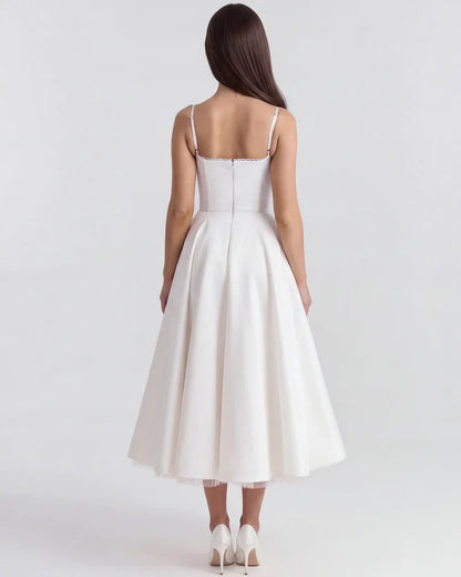 Belle - Robe midi avec couches de tulle et poches secrètes