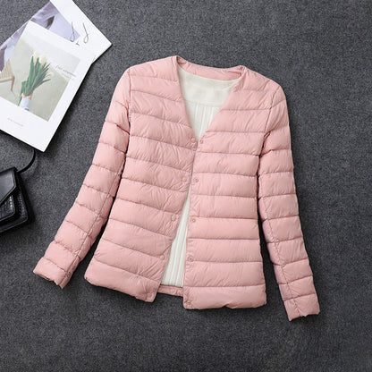 Giacca isolante leggera da donna – Indumento interno corto con scollo rotondo