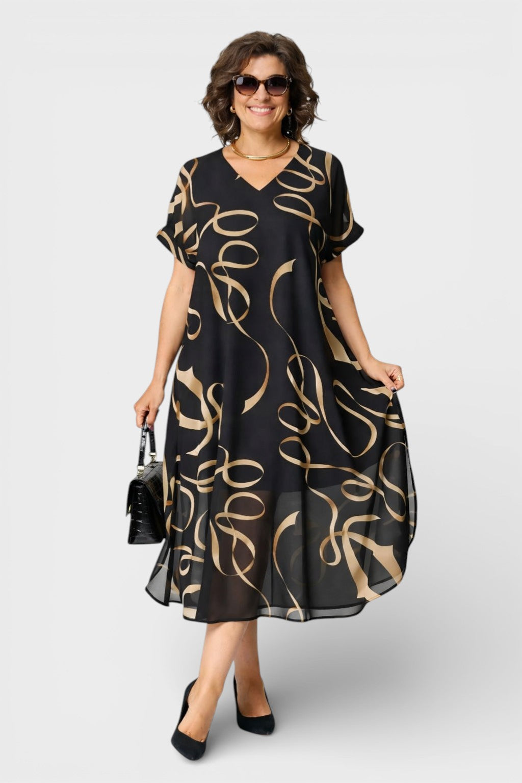 Emma™ | Vestido elegante negro y dorado