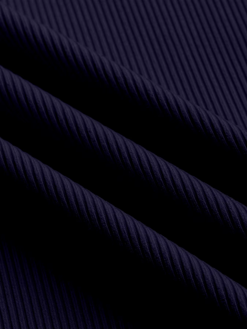 Valerisse – Elegantní bezramenný overal s texturou a širokými nohavicemi