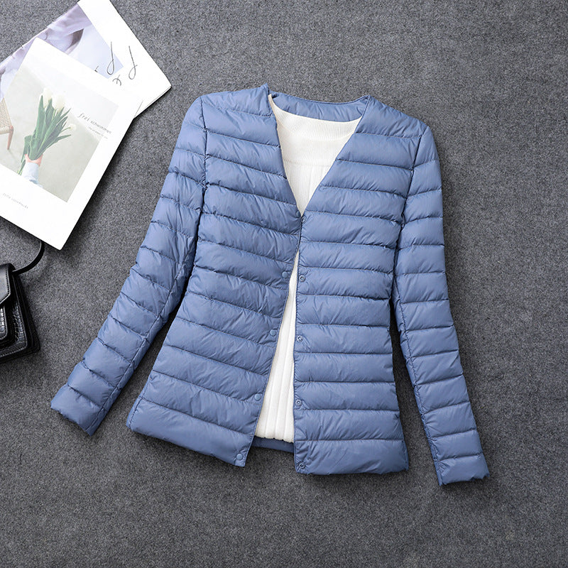 Giacca isolante leggera da donna – Indumento interno corto con scollo rotondo
