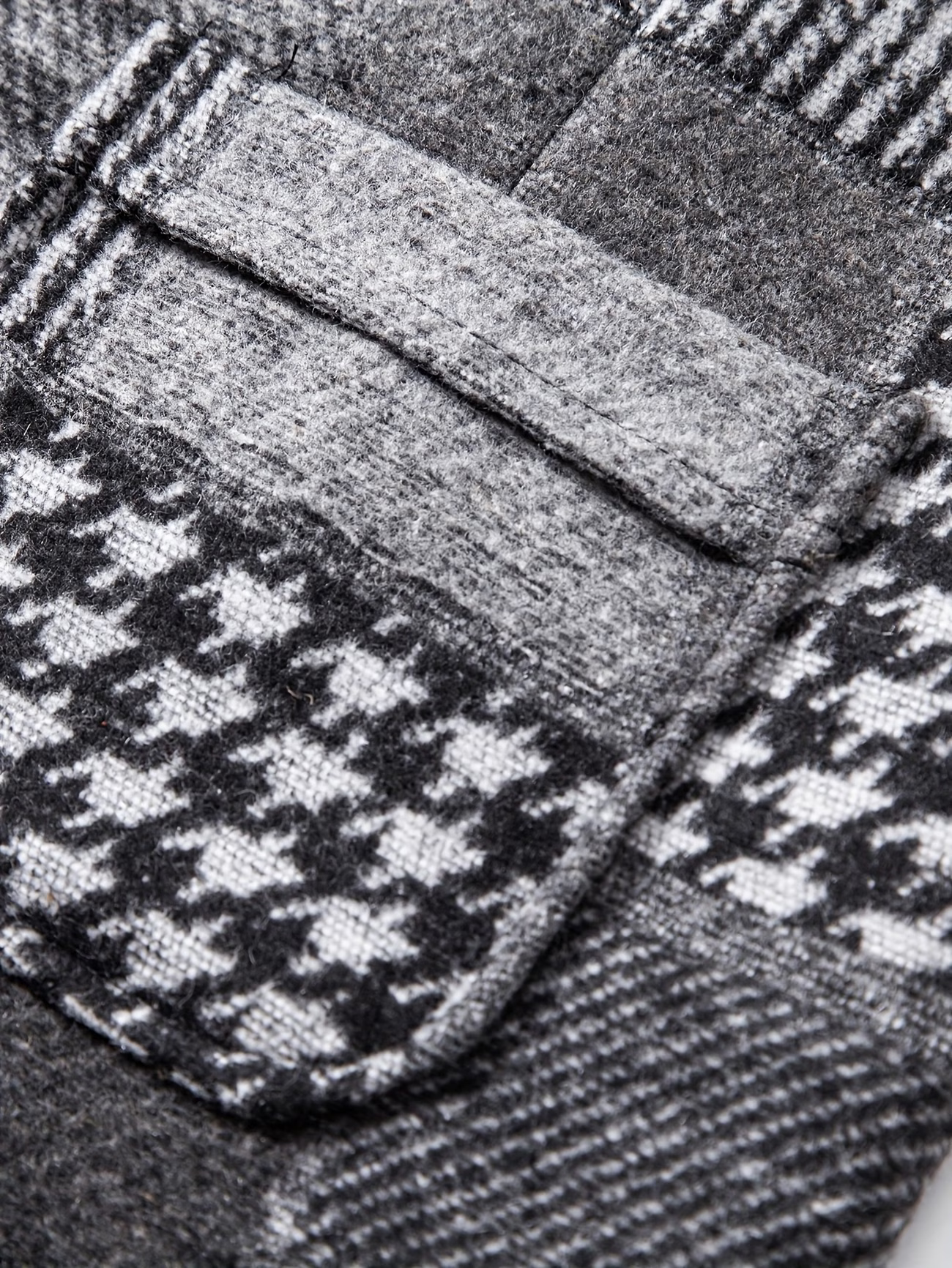Leo | Patchwork-tweedvest med fiskebensmønster