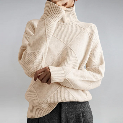 Paola – Le Pull Col Roulé Artistique