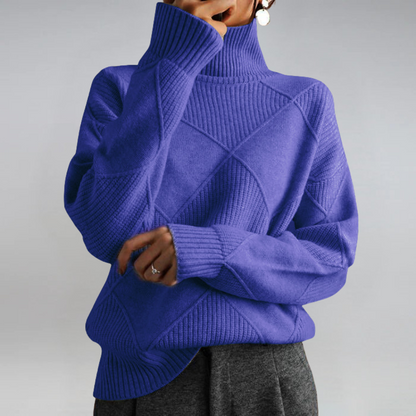 Paola – Le Pull Col Roulé Artistique