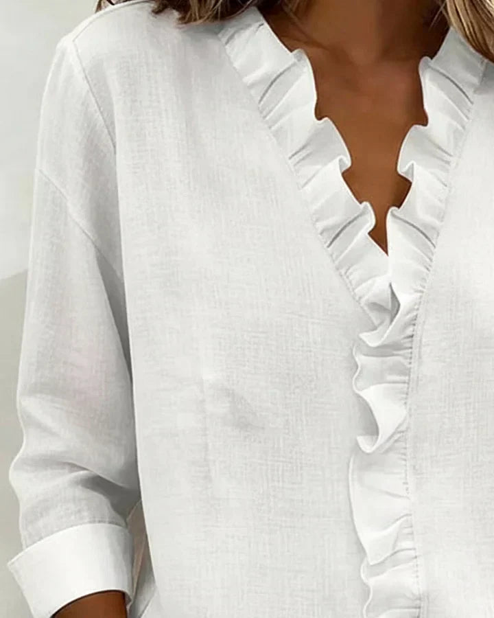 VIRELLO PARIS | Blouse à col en V et fines volants