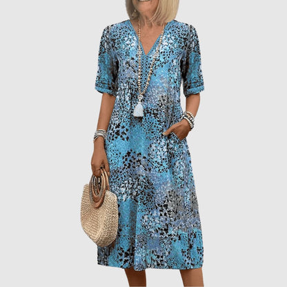 Zoé - Robe midi élégante à fleurs
