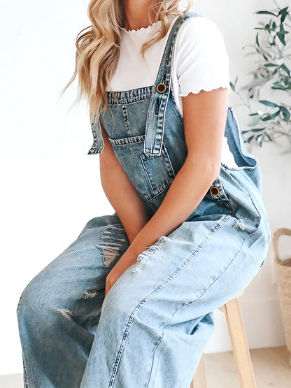 Ella - Løstsiddende denimoveralls i distressed look