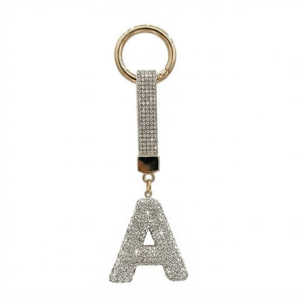 8721438353774 Zilverkleurige sleutelhanger met letter A en strass steentjes – initial sleutelhanger voor dames en heren – metalen sleutel hanger met ronde ring en decoratieve letter hanger