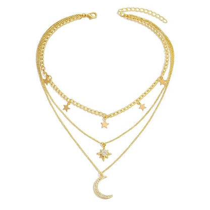 8721381451398 Dames Ketting – Gelaagd Design – Goudkleurig – Met Sterretjes, Maanhanger en Strassdetails