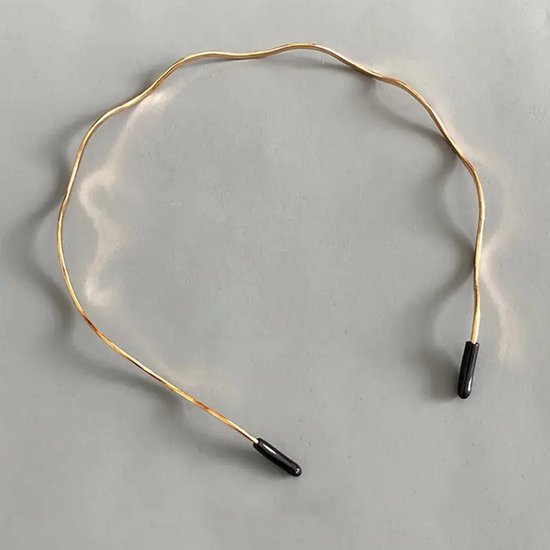 Dunne metalen haarband – goudkleurig met zwarte uiteinden – flexibele minimalistische hoofdband