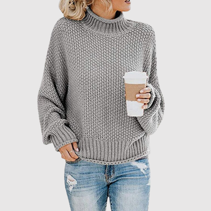 Amelia – Oversize damski sweter z wysokim kołnierzem