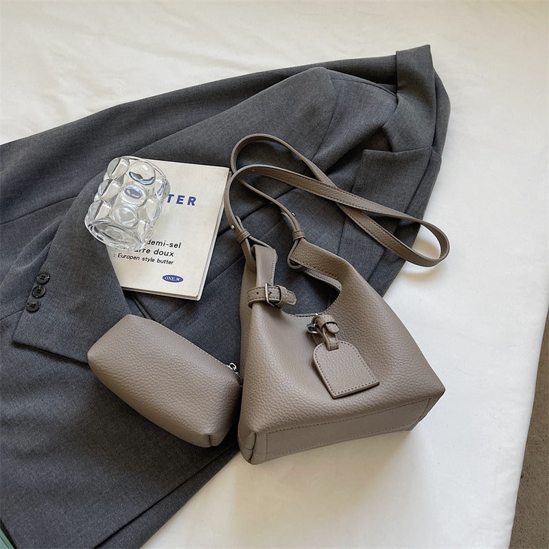 Vegane Leder Mini-Beuteltasche mit verstellbarem Riemen
