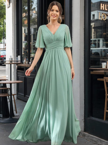 Abito Lungo in Chiffon Elegante – Silhouette Fluida A-Line con Spacco Laterale e Volant