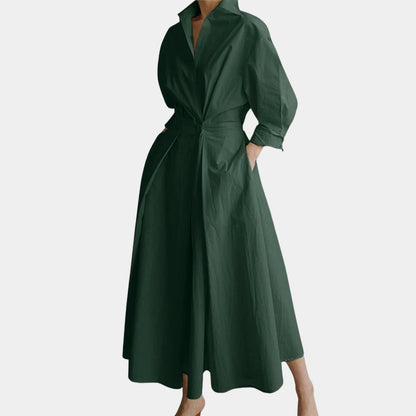 Elegant white midi trench coat with a belted waist, 3/4 sleeves, and lightweight fabric, featuring a classic collar and tailored design suitable for both formal and casual occasions.