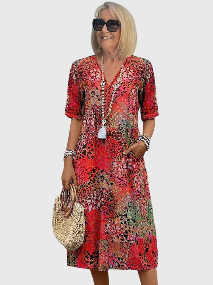 Bella | Sukienka midi w kwiaty – Elegancka sukienka midi na wesele z kwiatowym wzorem