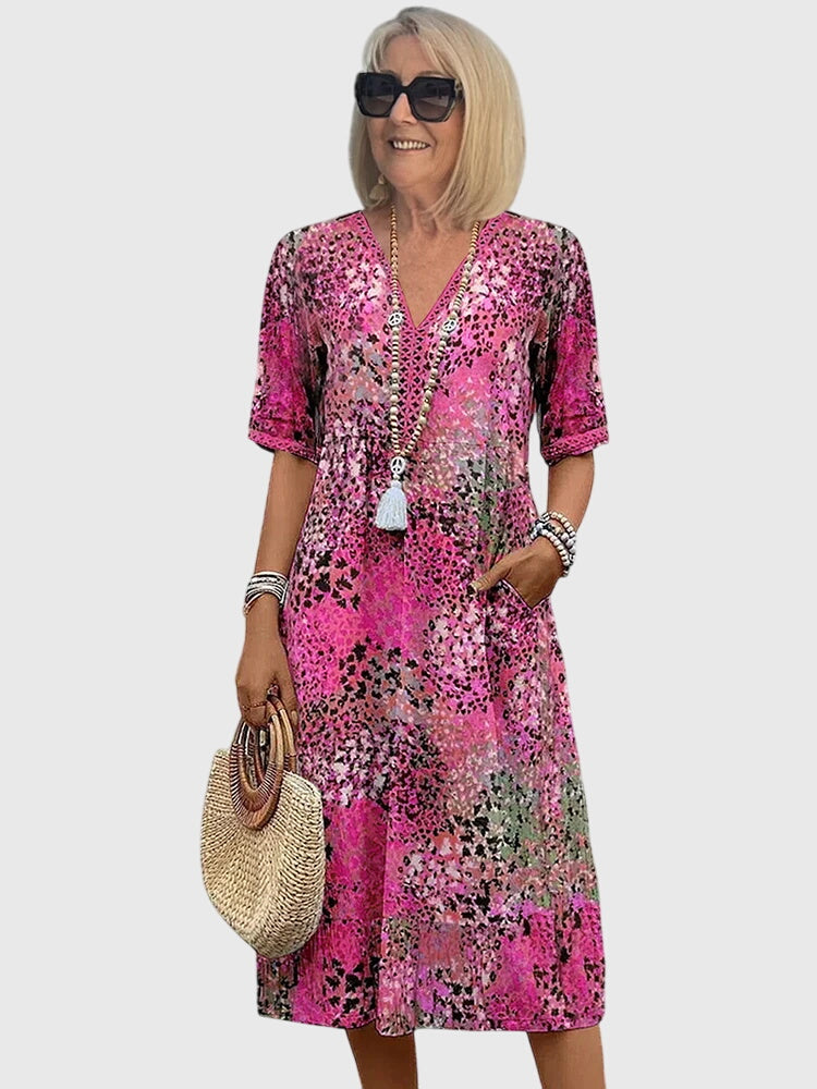 Bella | Sukienka midi w kwiaty – Elegancka sukienka midi na wesele z kwiatowym wzorem