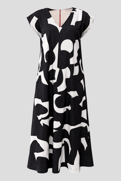Abito Donna Maxy con Stampa Astratta - Nero - abito estivo abito lungo abito maxy materiale leggero moda femminile scollatura a V stampa astratta stile artistico taglie disponibili vestibilità comoda - Concept Palermo