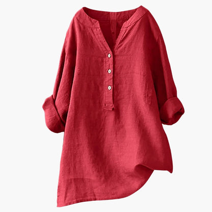 Chemise tunique rouge en lin pour femme, manches longues retroussées, col en V avec boutons, style décontracté et élégant.