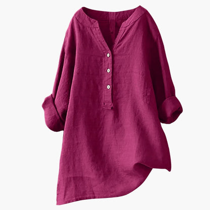 Chemisier ample en lin pour femme, couleur bordeaux, manches longues retroussées, col en V avec boutons, style décontracté et élégant.