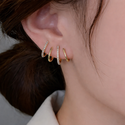 Evarune™ - Boucles d’Oreilles Femme Design Spirale Zirconiums Élégance Moderne