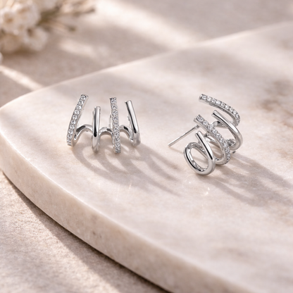 Evarune™ - Boucles d’Oreilles Femme Design Spirale Zirconiums Élégance Moderne