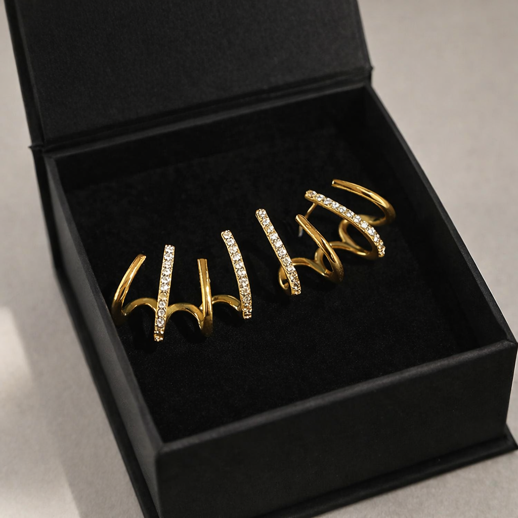 Evarune™ - Boucles d’Oreilles Femme Design Spirale Zirconiums Élégance Moderne
