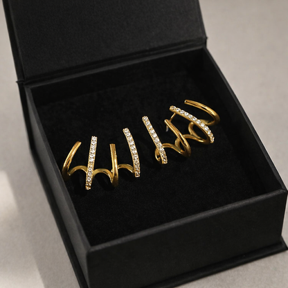 Evarune™ - Boucles d’Oreilles Femme Design Spirale Zirconiums Élégance Moderne