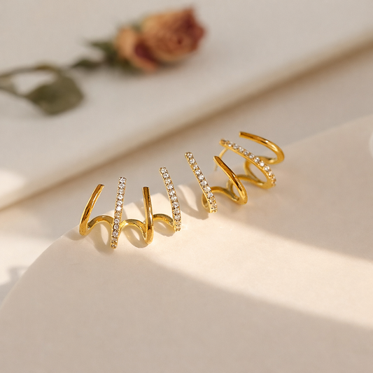 Evarune™ - Boucles d’Oreilles Femme Design Spirale Zirconiums Élégance Moderne