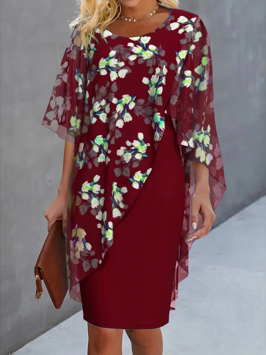Kvinners klänning för bröllopsgäst med chiffoncape och blommönster