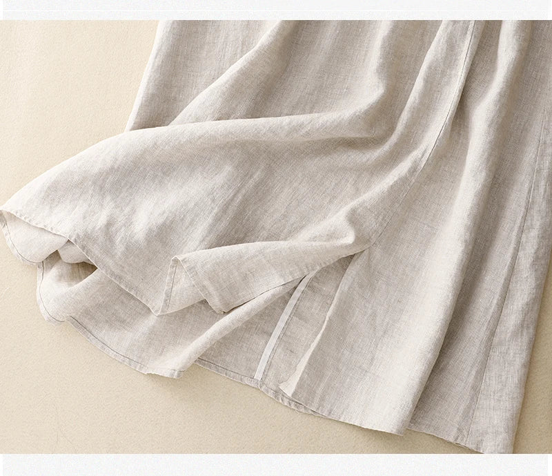Light blue linen skirt with a relaxed fit and a flowy style, perfect for casual summer outings. 7