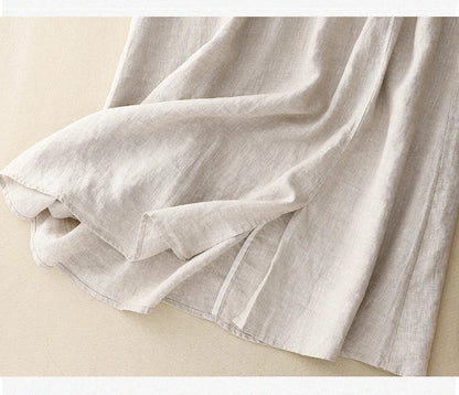 Light blue linen skirt with a relaxed fit and a flowy style, perfect for casual summer outings. 7