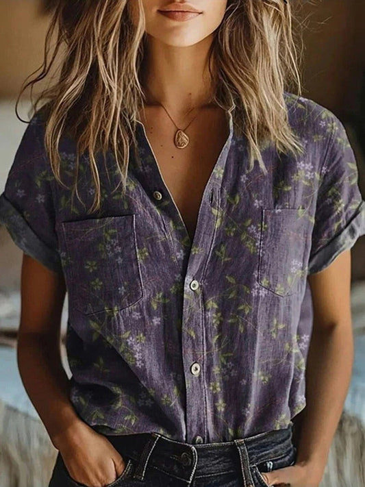 Floral blouse in soft pink with vintage-inspired design and delicate patterns. 0