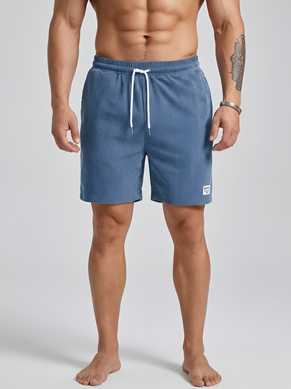 Pantaloncini sportivi uomo con coulisse elasticizzata e tasche casual palestra