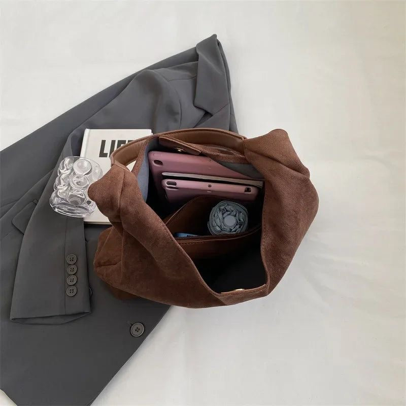 OTTILIE SUEDE SHOULDER BAG WITH MINIMALIST SHAPE